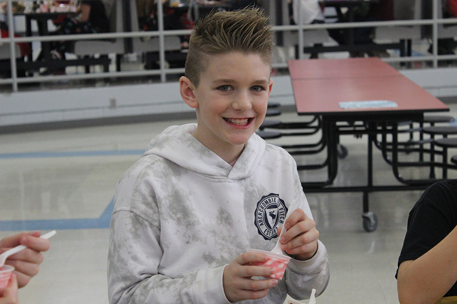 A student eats ice cream.