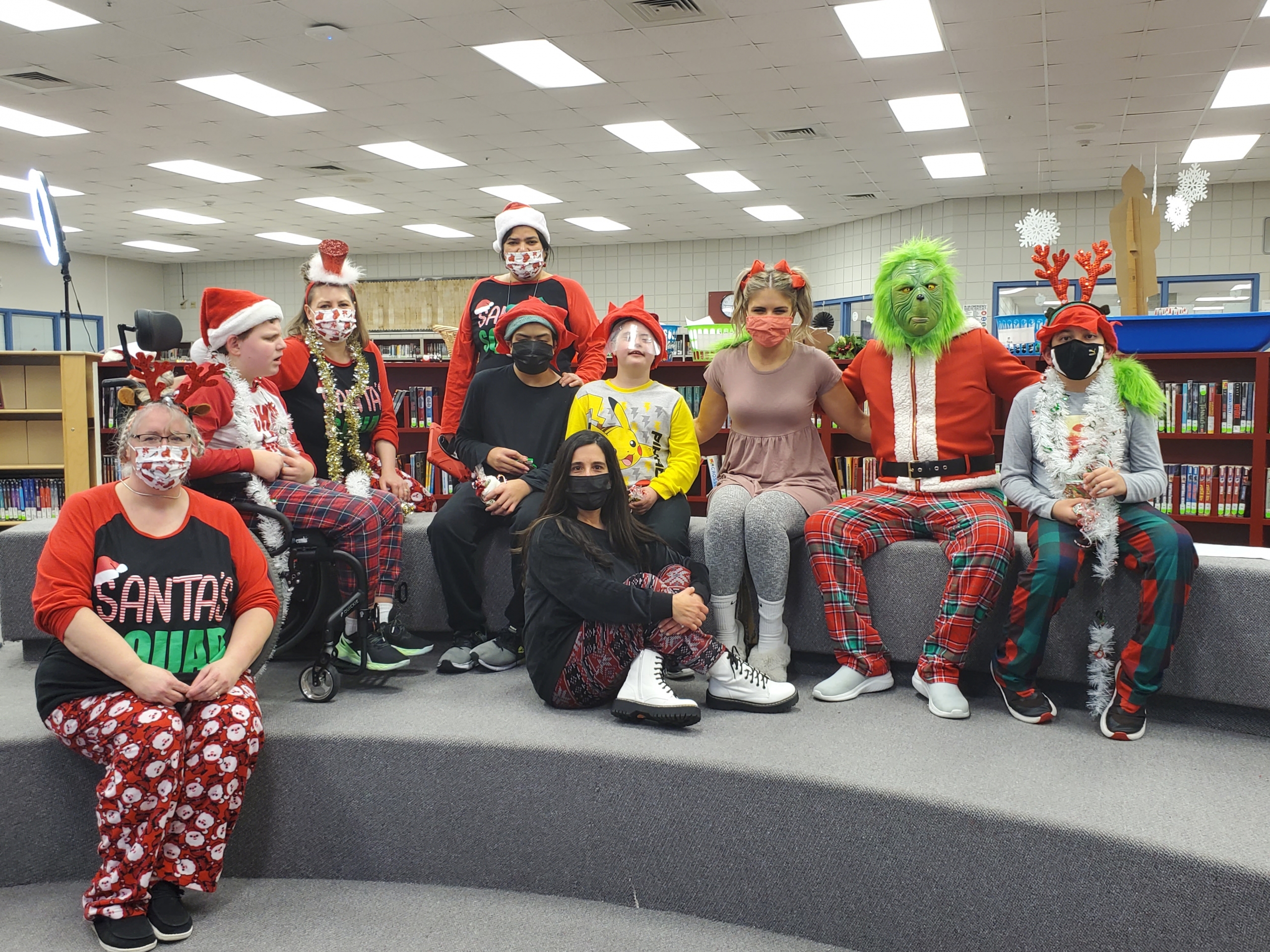 Rose Clary, Kahler librarian, brought the story, "How the Grinch Stole Christmas," to life for students in Mrs. Alessandrini's Applied Skills classroom. The Grinch was played by school principal, Mr. Newton, and Cindy Lou Who was played by math teacher, Mrs. Shreve. Under the direction of Mrs. Palasz, our 7th grade choir also performed.