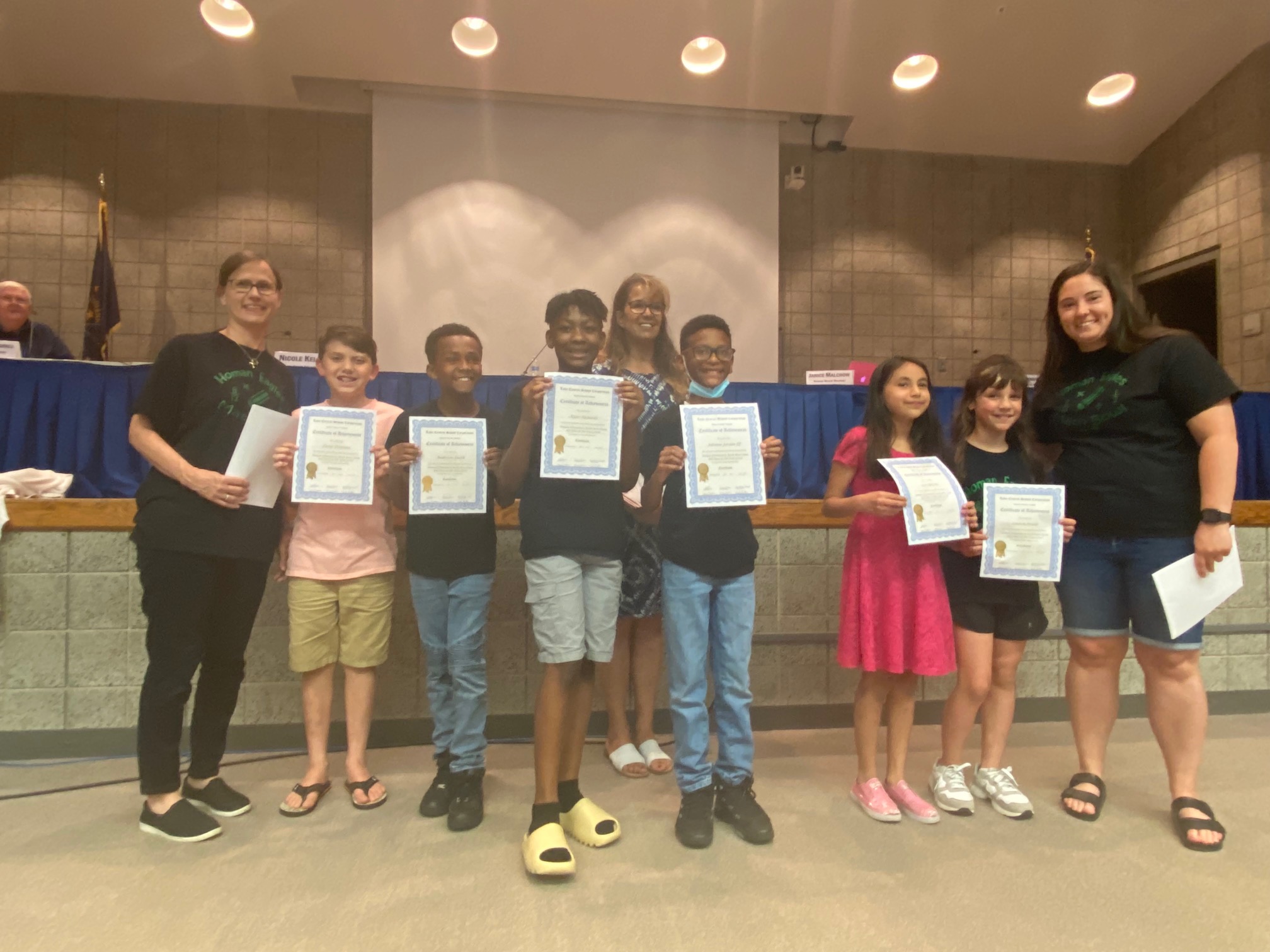 Homan's Math Bowl members placed 8th at the State level! Members are pictured at the Board meeting with their coaches Ms. Malatestinic and Ms. Miljevic.