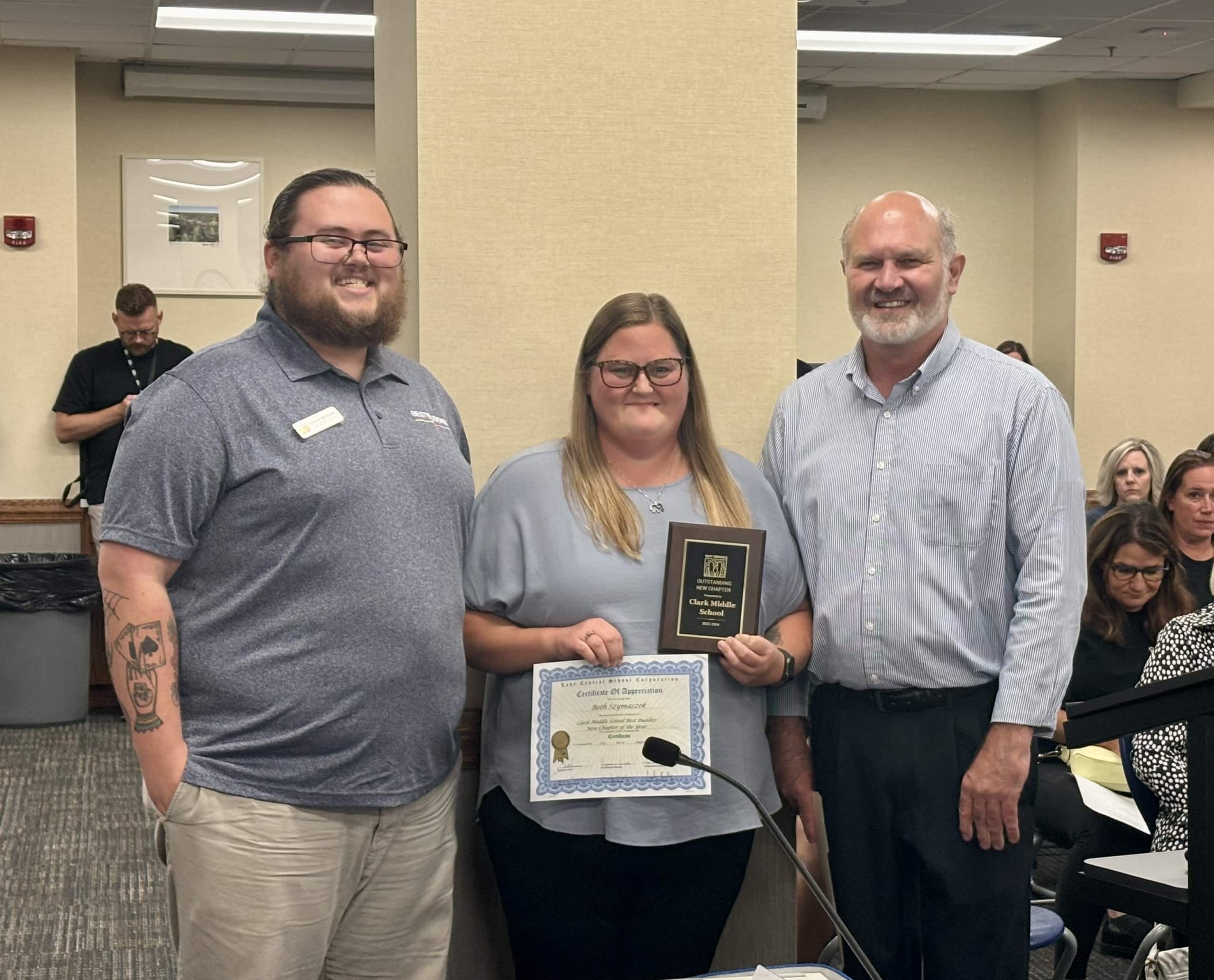 Beth Szymaszek, Clark Middle School program sponsor, was recognized by principal Scott Graber, and the LC School Board, for Clark Middle School Best Buddies program being awarded New Chapter of the Year by Best Buddies International.