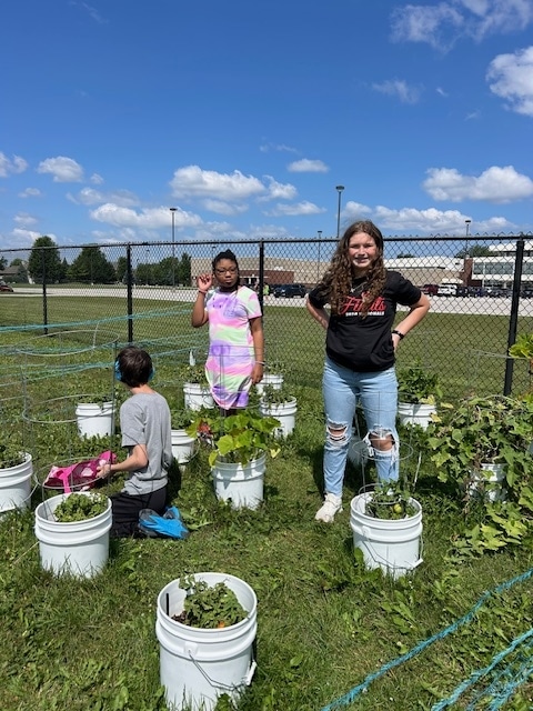 Students in Tracy Chandler's class at Clark MS continue to care for the squash, cucumbers and tomatoes they planted in May.