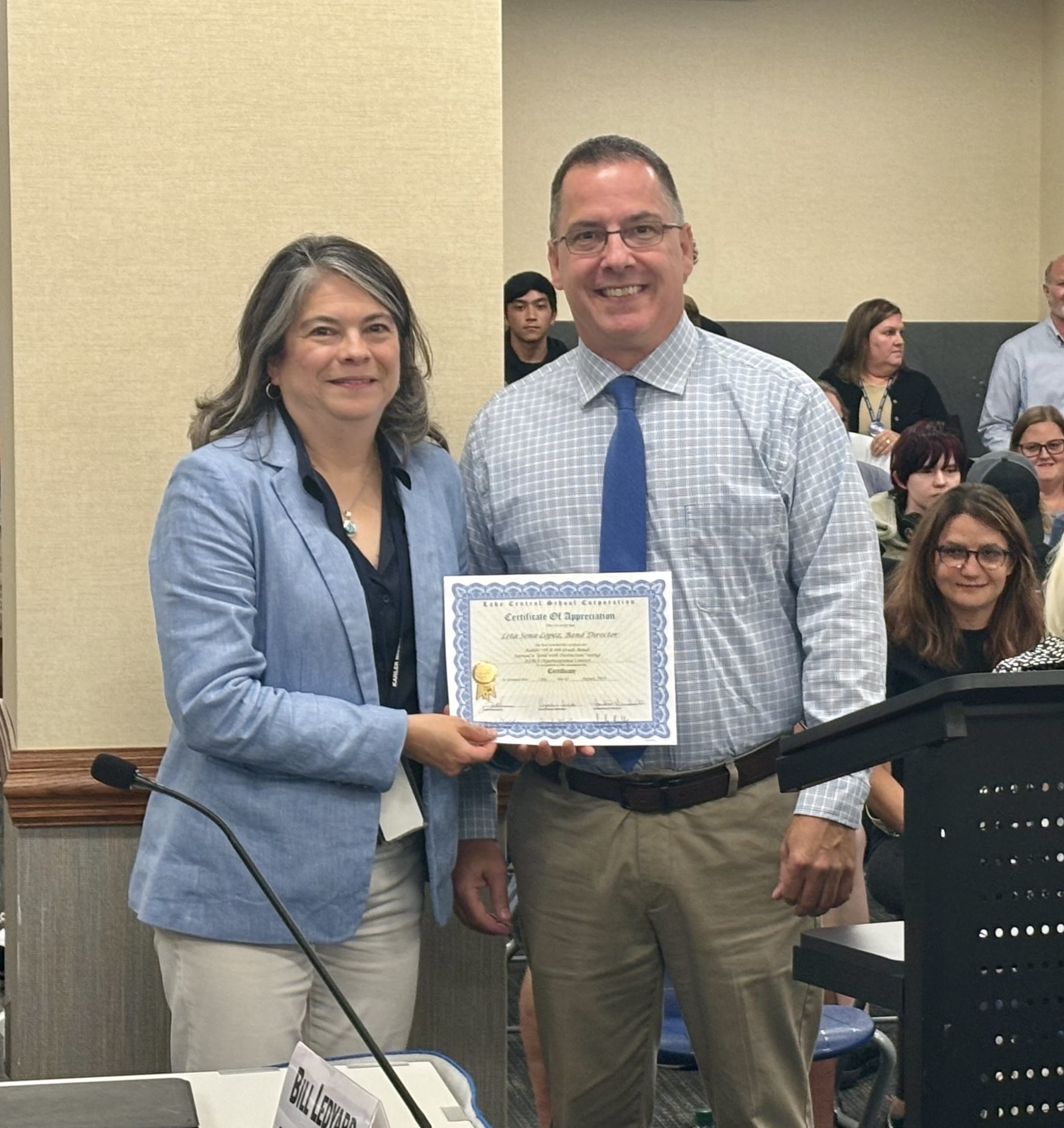 Kather Band Director, Leta Sena-Lopez, was recognized by Kahler principal Ken Newton and the LC School Board, for Kahler 7th and 8th grade bands earning a "Gold with Distinction" rating at ISSMA.