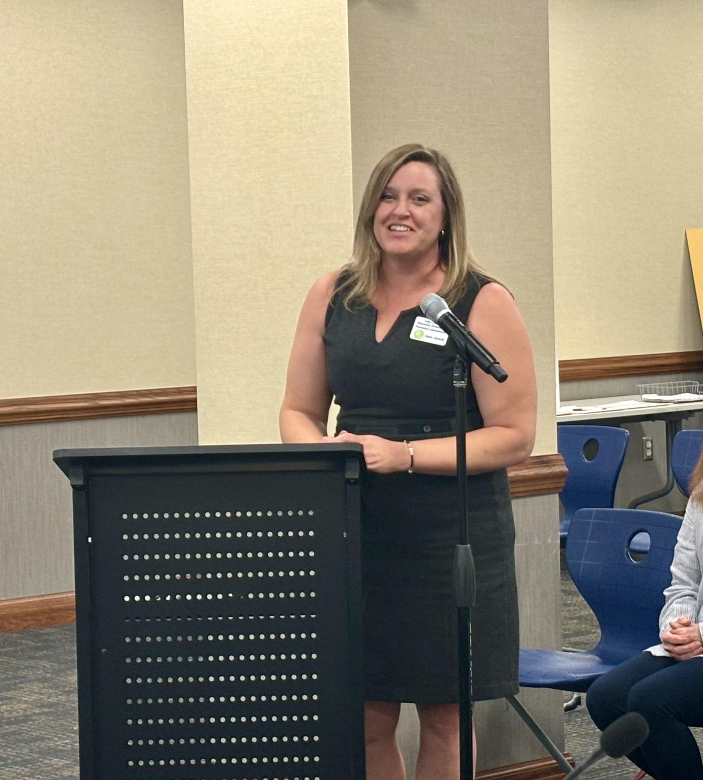 Dawn Czarnik, newly appointed Administrator for the The Lake Central Education Foundation, greets the Lake Central School Board.