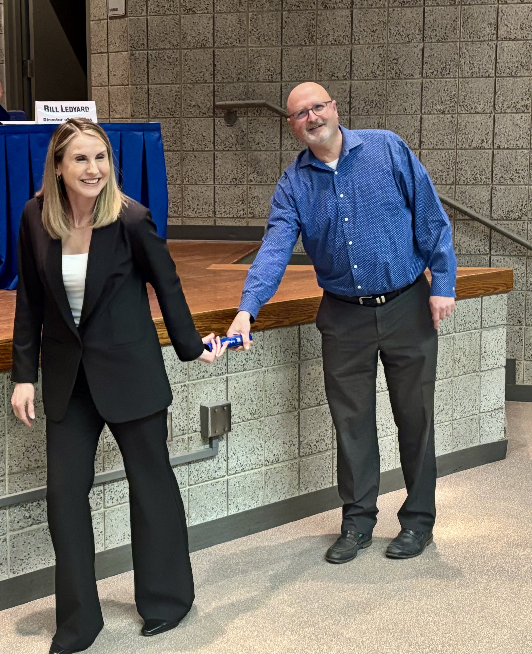 Current Superintendent Dr. Veracco "passes the baton" to Mrs. Sarah Castaneda as newly appointed Lake Central School Corporation Superintendent. CONGRATULATIONS, MRS. CASTANEDA!!